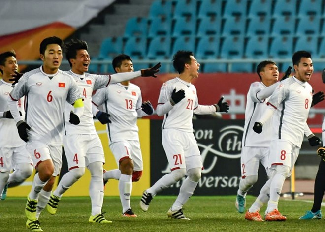 Các cầu thủ U23 Việt Nam ăn mừng sau chiến thắng lịch sử trưởng U23 Qatar. (Nguồn: The AFC.com)