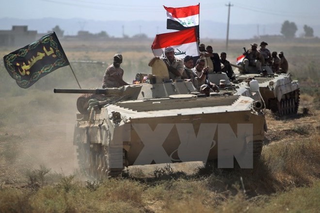 Binh sĩ Iraq sau khi giành quyền kiểm soát thành phố Hawija từ tay IS. (Nguồn: AFP/TTXVN)