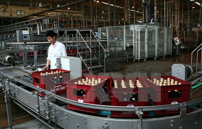 Dây chuyền sản xuất của Habeco tại nhà máy bia Hà Nội-Mê Linh. (Ảnh: Huy Hùng/TTXVN)