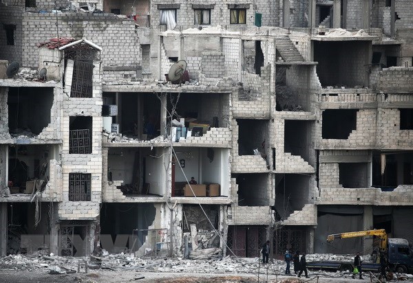 Cảnh đổ nát tại tại Otaybah, Đông Ghouta, Syria. (Nguồn: AFP/TTXVN)