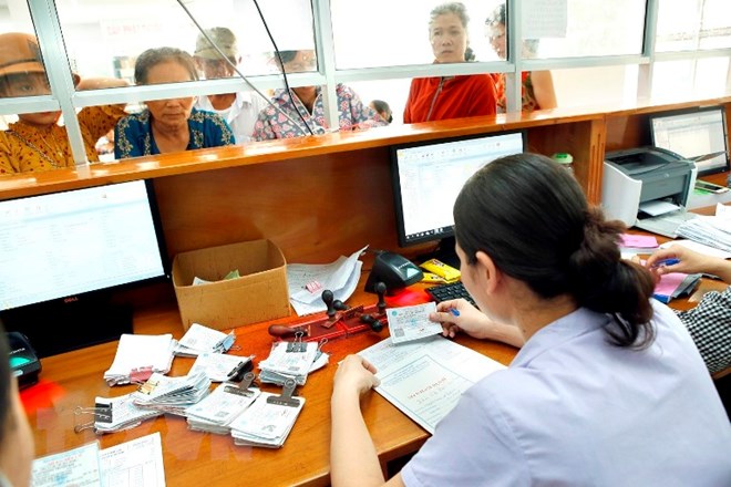 Nhiều bệnh nhân được quỹ bảo hiểm y tế chi trả hàng tỷ đồng Đã có gần 87% dân số tham gia bảo hiểm y tế. (Ảnh: Dương Ngọc/TTXVN)