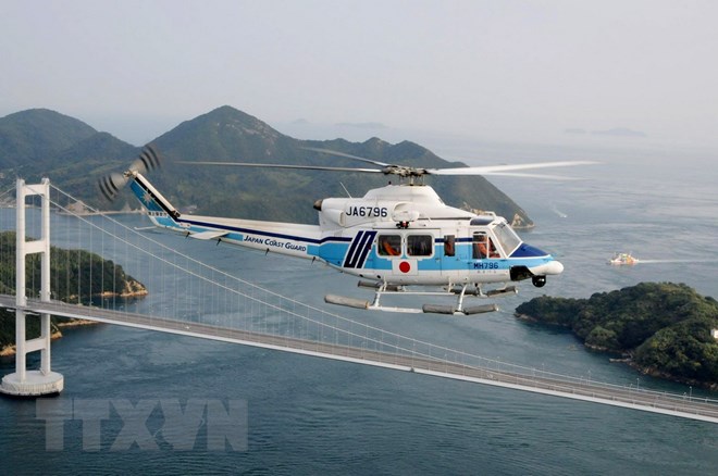 Ảnh tư liệu: Máy bay trực thăng cứu hộ Bell 412EP của Nhật Bản. (Nguồn: AFP/TTXVN)