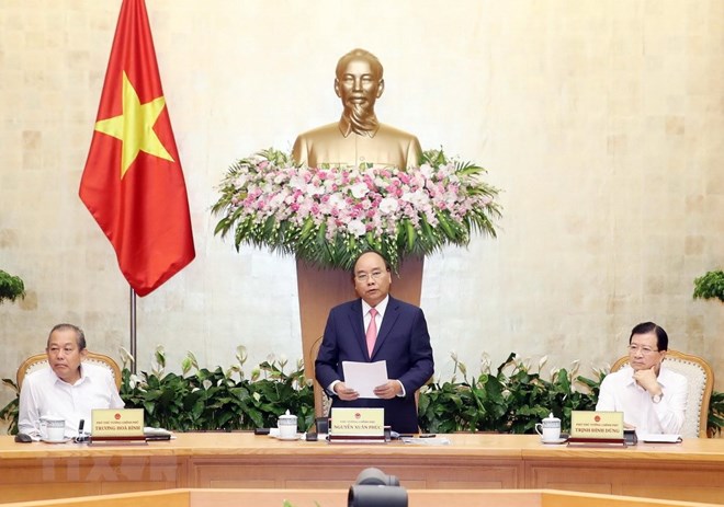 Thủ tướng Nguyễn Xuân Phúc chủ trì Phiên họp Chính phủ thường kỳ tháng 7/2018. (Ảnh: Thống Nhất/TTXVN)