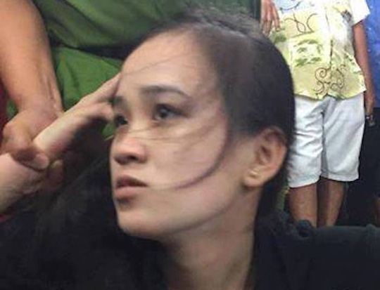 Tuyền lúc bị bắt giữ. Ảnh: Bình Minh