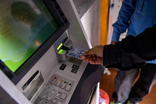 Hacker tấn công, rút liên tiếp hàng chục triệu đồng từ tài khoản ATM Ảnh chỉ có tính minh họa. (Nguồn: AFP/TTXVN)