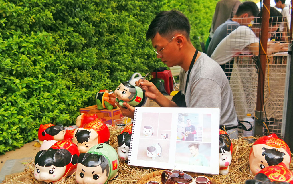 Thay "áo mới” cho heo đất tuổi thơ