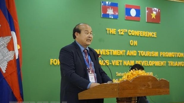 Vietnam, Laos, Cambodia discusses measures to boost border trade A delegate speaking at the conference (Photo: VNA)