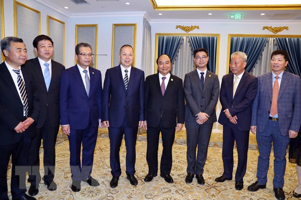Thủ tướng Nguyễn Xuân Phúc tiếp lãnh đạo các doanh nghiệp hàng đầu trong lĩnh vực cơ sở hạ tầng của Trung Quốc. (Ảnh: Thống Nhất/TTXVN)