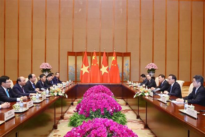 Prime Minister holds talks with Chinese Premier At the talks (Source: VNA)