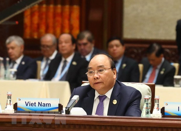 Thủ tướng Nguyễn Xuân Phúc phát biểu tại phiên thứ ba: “Thúc đẩy phát triển xanh và bền vững để thực hiện Chương trình Nghị sự 2030 của Liên hợp quốc.” (Ảnh: Thống Nhất/TTXVN)