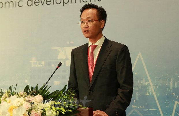 Đồng chí Nguyễn Hữu Nghĩa, Phó Trưởng Ban Kinh tế Trung ương phát biểu tại hội thảo. (Ảnh: BKT/Vietnam+)