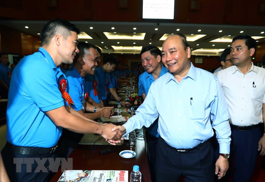 Thủ tướng Nguyễn Xuân Phúc gặp gỡ với công nhân, lao động kỹ thuật cao năm 2019. (Ảnh: Thống Nhất/TTXVN)