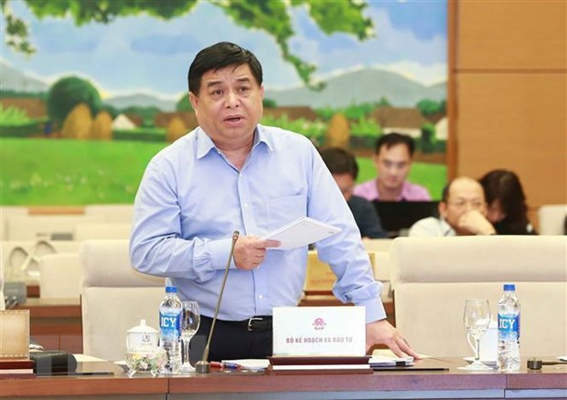 Đề nghị giữ nguyên tiêu chí phân loại dự án quan trọng quốc gia Bộ trưởng Bộ Kế hoạch và Đầu tư Nguyễn Chí Dũng phát biểu. (Ảnh: Doãn Tấn/TTXVN)