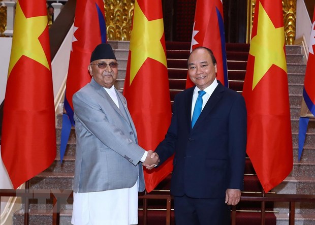 Thủ tướng Nguyễn Xuân Phúc và Thủ tướng Nepal K.P. Sharma Oli chụp ảnh chung trước hội đàm tại trụ sở Chính phủ. (Ảnh: Thống Nhất/TTXVN)
