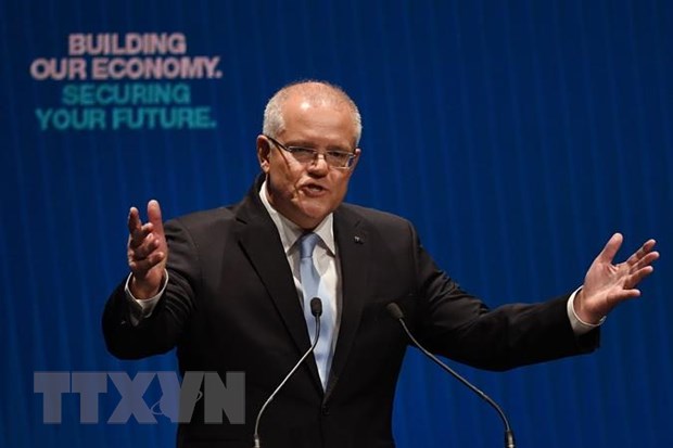 Thủ tướng Australia Scott Morrison (giữa) tại chiến dịch vận động tranh cử ở Melbourne ngày 12/5 vừa qua. (Ảnh: AFP/TTXVN)