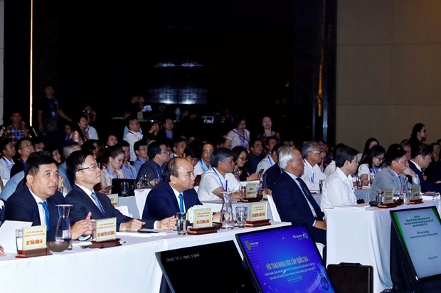 Thủ tướng Nguyễn Xuân Phúc dự Hội thảo khoa học cấp quốc gia về vấn đề pháp lý trong cách mạng công nghiệp lần thứ tư. (Ảnh: Thống Nhất/TTXVN)