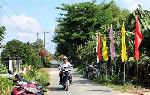 A road paved with asphalt in Long Thoi commune of Tieu Can district, Tra Vinh province (Photo: VNA)