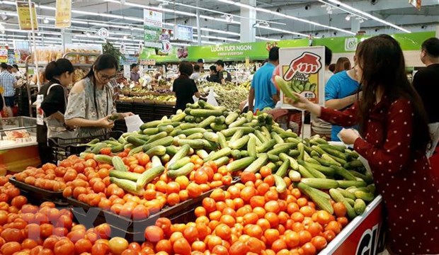 Nông sản an toàn được đưa vào tiêu thụ tại hệ thống các siêu thị. (Ảnh: Phương Anh/TTXVN)