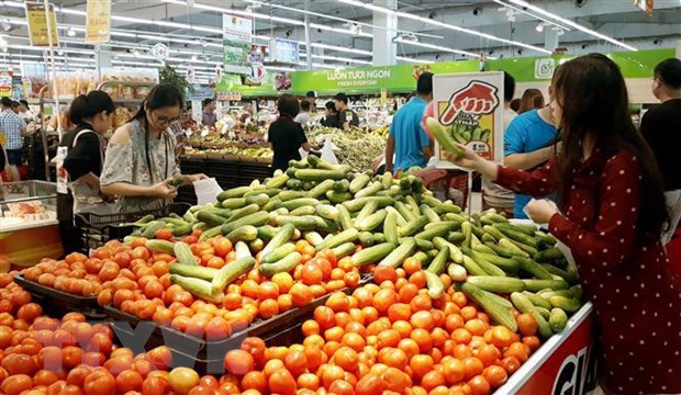 Người Việt ưu tiên dùng hàng Việt: Tăng sức cạnh tranh cho nông sản Nông sản an toàn được đưa vào tiêu thụ tại hệ thống các siêu thị. (Ảnh: Phương Anh/TTXVN)