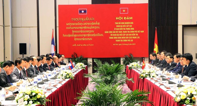 Vietnamese, Lao parties share inspection experience