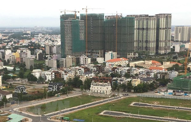 Thực hiện dự án nhà ở: 5 luật chi phối và hàng loạt thủ tục chồng chéo Ảnh minh họa. (Nguồn: TTXVN)