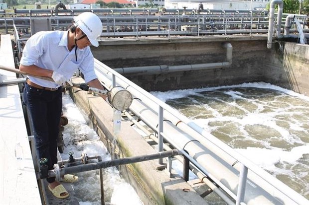 State audit to urge environmental protection An expert checks wastewater at a wastewater treatment system in the Thang Long Industrial Zone in Hanoi's Dong Anh district (Photo: VNA)