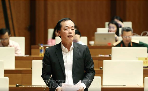 Bộ trưởng Bộ Xây dựng Phạm Hồng Hà giải trình làm rõ ý kiến đại biểu Quốc hội nêu. (Nguồn: TTXVN)