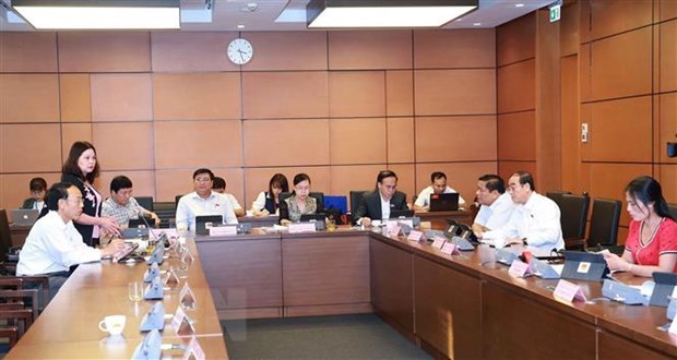 A group working session of NA deputies. Illustrative image (Photo: VNA)