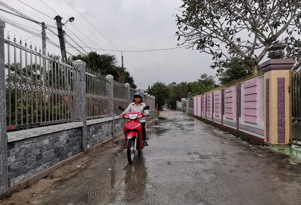 Người dân ấp Thanh Phú xây dựng cổng và hàng rào kiên cố theo tiêu chí nông thôn mới nâng cao