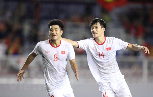 Đức Chinh ăn mừng sau khi ghi bàn thắng vào lưới U22 Singapore. (Ảnh: Vietnam+)