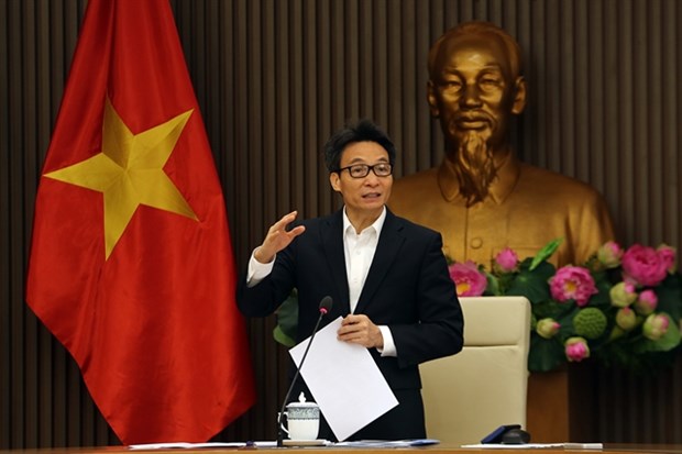 Deputy Prime Minister Vu Duc Dam speaks at a meeting organised by the National Council for Sustainable Development and Competitiveness Improvement held in Hanoi on December 6. (Photo: chinhphu.vn)