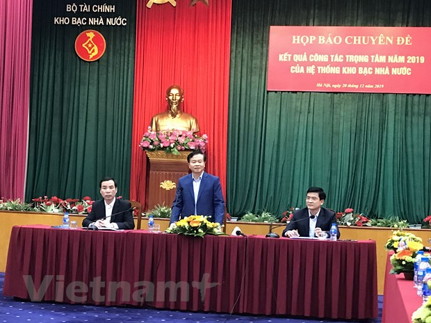 Ông Nguyễn Quang Vinh, Phó Tổng Giám đốc Kho bạc Nhà nước phát biểu tại họp báo. (Ảnh: Đức Duy/Vietnam+)