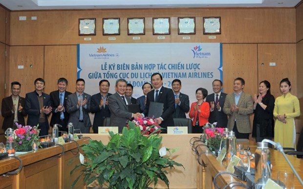 At the signing ceremony (Photo: VNA)
