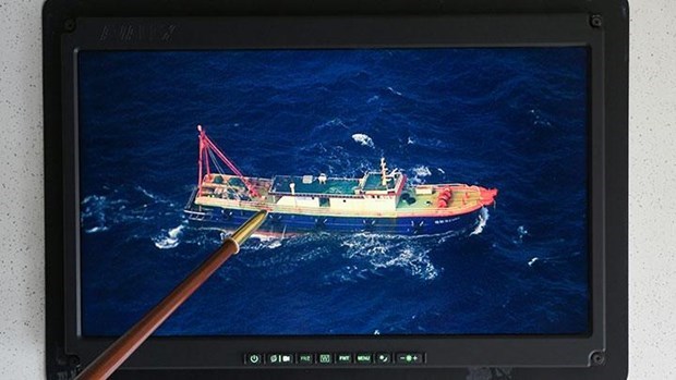 Movement of foreign fishing boats shown through a screen connected to surveillance cameras from an aircraft on Natuna waters, Indonesia. (Photo: Antara News)