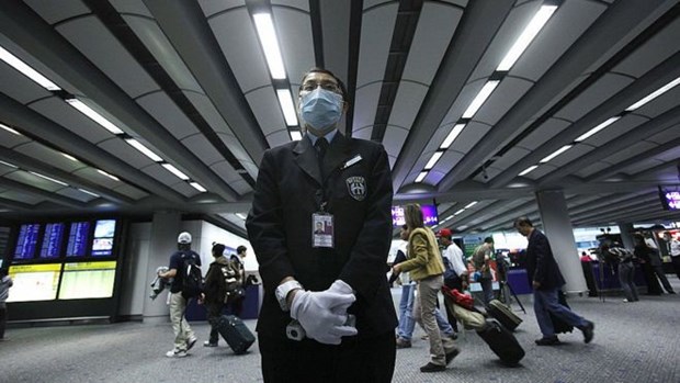 Sân bay Hong Kong kiểm tra sức khỏe những hành khách đến từ Vũ Hán. (Nguồn: Getty Images)