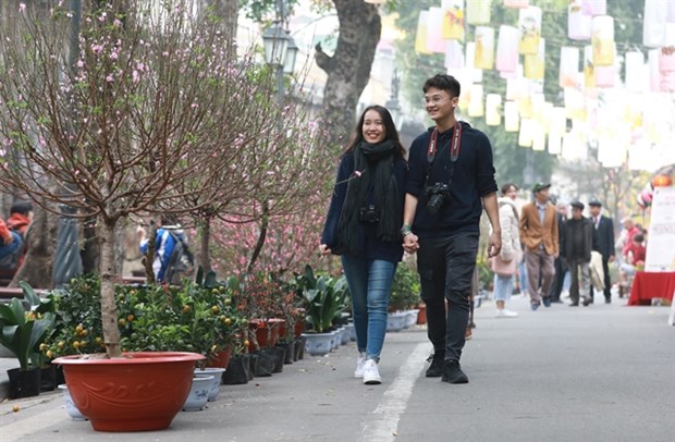 The market is a reason for people to take a walk round the area. (Photo: VNS)