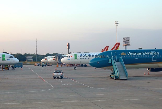 Flights to carry Vietnamese in nCoV-hit China back home Planes of Vietnamese airlines at Noi Bai International Airport in Hanoi (Photo: VNA)