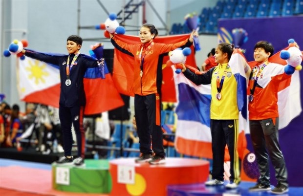 SEA Games champion Nguyen Thi My Hanh (on the top podium) is one of Vietnamese wrestlers ready to compete at the Senior Asian Wrestling Championship in India next week. (Photo webthethao.vn)