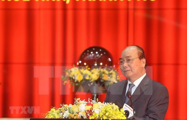 Prime Minister urges tax sector to continue with reform Prime Minister Nguyen Xuan Phuc speaks at a conference of the tax sector on February 26. (Photo: VNA)