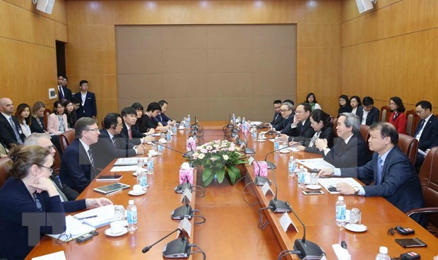 At the working session (Photo: VNA)