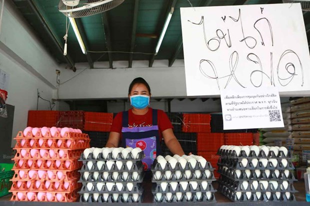 Thailand bans export of chicken eggs for seven days A vendor sells duck eggs in front of a sign reading "out of chicken eggs", at Pak Nam market in Samut Prakan province (Photo:https://www.bangkokpost.com/)