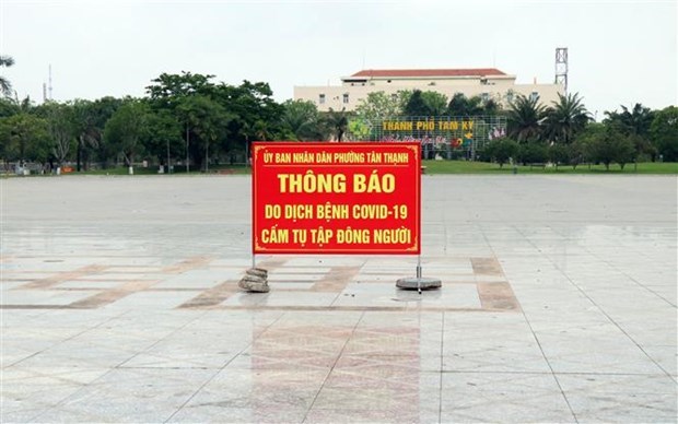 One more COVID-19 patient discharged from hospital One more COVID-19 patient discharged from hospitalA notice board warns people of ban on massive gatherings in Quang Nam (Source: VNA)