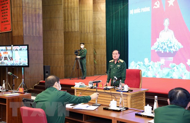 Quân đội kiên quyết tiếp tục phòng, chống dịch đến thắng lợi cuối cùng Thượng tướng Trần Đơn, Thứ trưởng Bộ Quốc phòng, Trưởng ban Chỉ đạo Bộ Quốc phòng chủ trì cuộc họp. (Ảnh: Dương Giang/TTXVN)