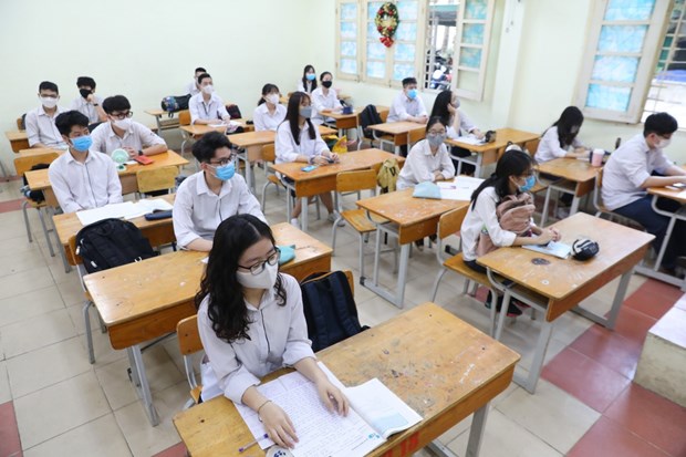 Tens of millions of students back to school after long COVID-19 break A class of the Viet Duc High School in Hanoi's Hoan Kiem district. Hanoi reopened junior and senior high schools on May 4 after a three-month closure (Photo: VNA)