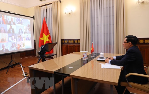 Phó Thủ tướng, Bộ trưởng Bộ Ngoại giao Phạm Bình Minh dự phiên thảo luận mở cấp cao trực tuyến của HĐBA LHQ về Khí hậu và An ninh. (Ảnh: Lâm Khánh/TTXVN)