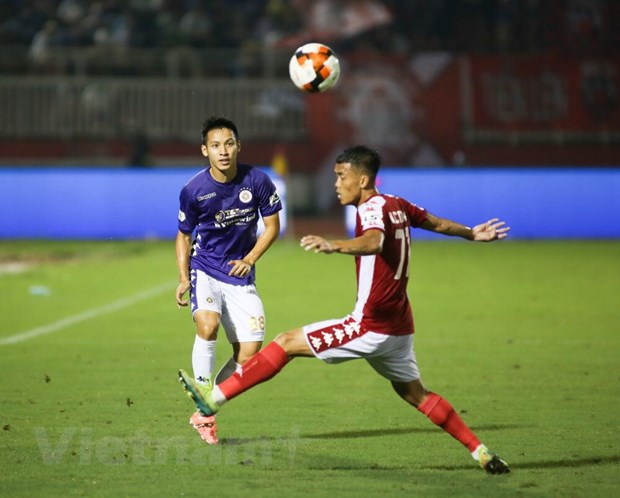 TP.HCM và Hà Nội FC cống hiến trận đấu hấp dẫn ở vòng 11 V-League 2020 dù kết quả chung cuộc là 3-0 nghiêng về đội khách. (Ảnh: Nam An/Vietnam+)