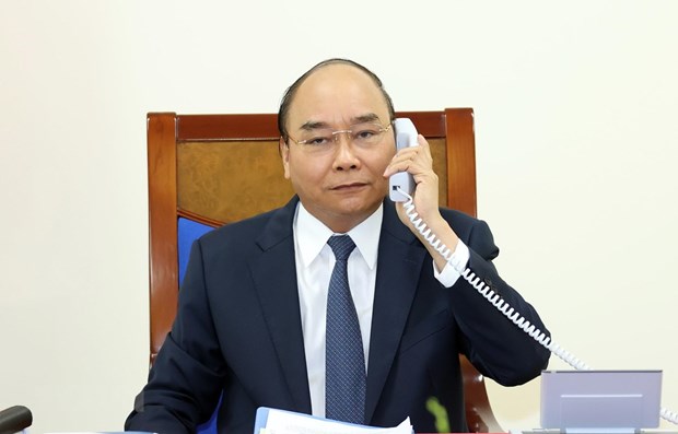 Vietnamese PM, German Chancellor hold phone talks Prime Minister Nguyen Xuan Phuc (Photo: VNA)