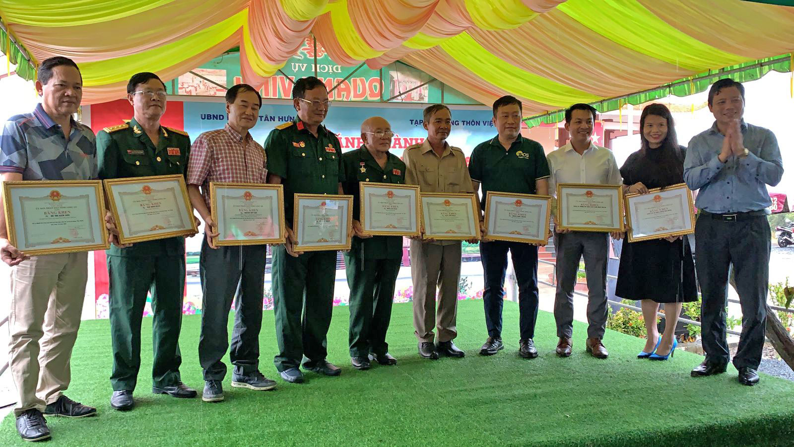 The collectives and individuals are commended for their contributions to the implementation of social work in Tan Hung district