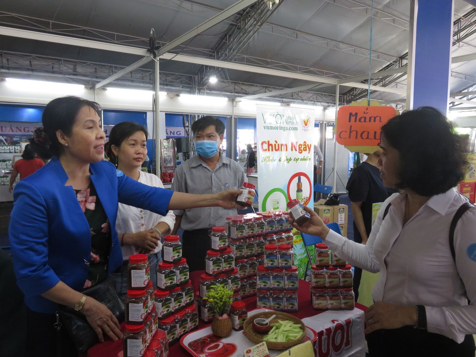 Products are displayed and promoted by the booth of Long An province