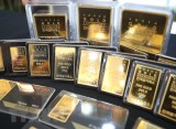 Giá vàng thế giới tuần qua giảm 1% do đồng USD mạnh lên